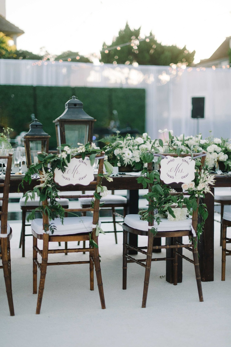 "Mr." and "Mrs." Signs, Vines, Wooden Chairs
Photography: John Schnack Photography
Read More:
http://www.insideweddings.com/weddings/sweet-simple-beach-wedding-with-wood-detailing-in-california/870/ mr and mrs signs wooden chairs vines lanterns tables california outdoor reception beach
