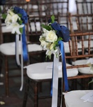 Winter Ceremony Seating Decoration
Photography: Kirsten Shultz
Read More:
http://www.insideweddings.com/weddings/genevieve-cortese-and-jared-padalecki/338/ White rose and lily with blue and white ribbon along aisle