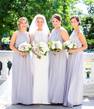 Bridesmaids in Lavender High-Neck Gowns
Photography: Kurstin Roe Photography
Read More:
http://www.insideweddings.com/weddings/elegant-outdoor-ceremony-ballroom-reception-in-washington-dc/1169/ Jasmine bridesmaid dresses floor length bridesmaid bride white lavender purple bouquets