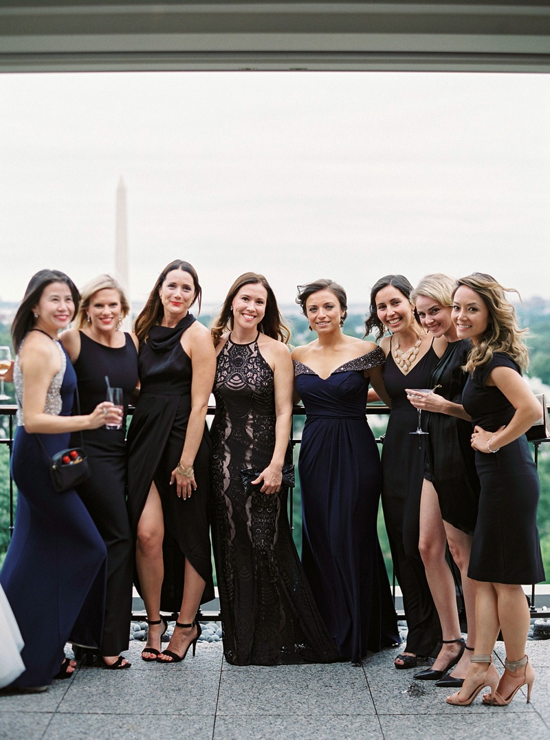 Fashionable Guests in Washington, DC
Photography: Branco Prata
Read More:
http://www.insideweddings.com/weddings/chic-destination-wedding-with-california-style-in-washington-dc/1042/ Wedding guests in high neck slit off shoulder short long guest dresses holding drinks