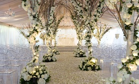 Ceremony Décor
Photography: Simone %26 Martin Photography
Read More:
http://www.insideweddings.com/weddings/soft-romantic-fall-winery-wedding-in-santa-barbara-california/344/ Tented wedding ceremony with trees wrapped with white roses and hydrangeas