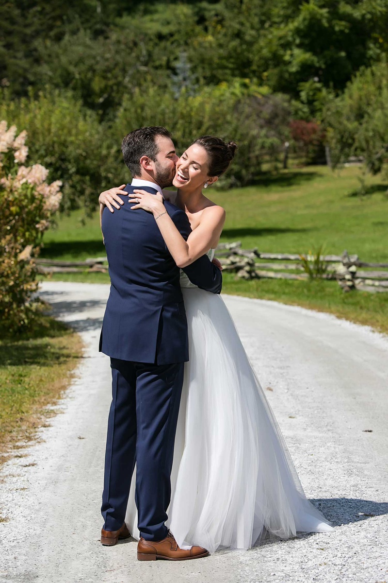Bride %26 Groom Embrace at Farm Venue
Photography: Vue Photography
Read More:
http://www.insideweddings.com/weddings/destination-rustic-fall-wedding-at-a-farm-in-north-carolina/1202/ bride in strapless a line wedding dress hair up high bun groom in navy blue suit brown dress shoes