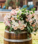 Wood Barrel with Blush %26 Ivory Flowers
Photography: Jennifer Lindberg Weddings
Read More:
http://www.insideweddings.com/weddings/angela-akins-and-sergio-garcia/1164/ Wedding ceremony outdoor Sergio Garcia golfer wood barrel with fresh flowers on top