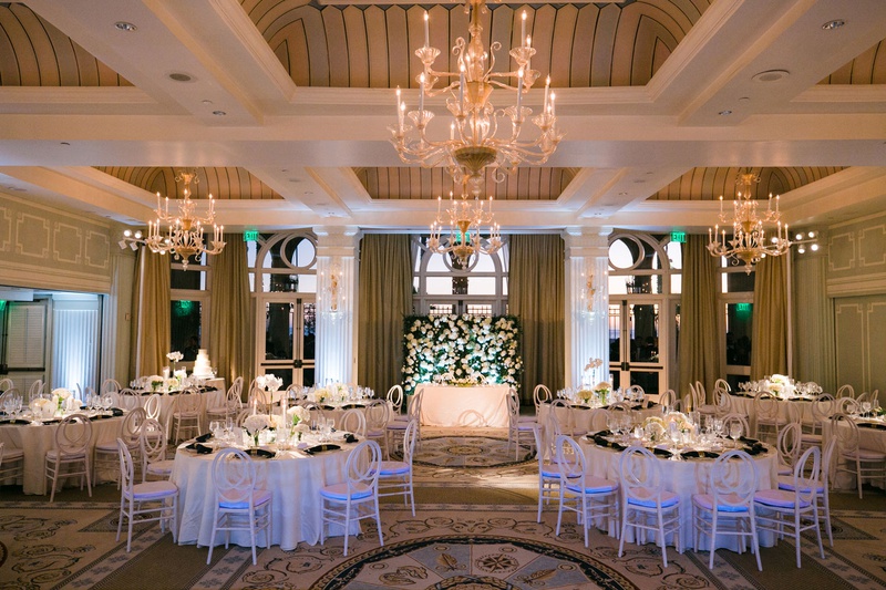 Santa Monica Beachfront Ballroom
Photography: Michelle Beller Photography
Read More:
http://www.insideweddings.com/weddings/classic-ceremony-beachfront-ballroom-reception-in-santa-monica/1234/ casa del mar wedding reception ballroom chandelier sweetheart table greenery white centerpieces