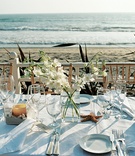 Oceanfront Reception Table
Photography: Suzanne Karp Photography
Read More:
http://www.insideweddings.com/weddings/seaside-wedding-in-california-with-beach-themed-decor/45/ Seaside reception table decorations with ocean view