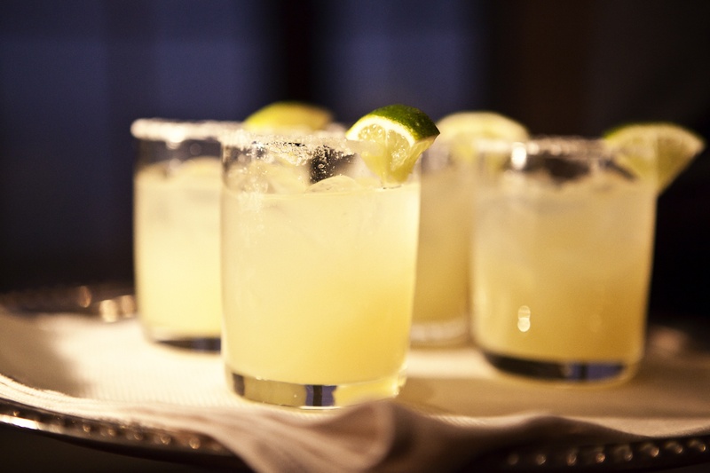 Salt-Rimmed Glasses
Photography: Catherine Hall Studios
Read More:
http://www.insideweddings.com/weddings/metropolitan-san-francisco-wedding-at-luxury-hotel/411/ Short glass cups of margarita with salt and lime