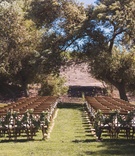 Simple, Outdoor Winery Wedding
Photography: Matt Kennedy Photography
Read More:
http://www.insideweddings.com/weddings/alfresco-ceremony-rustic-chic-barn-reception-in-san-luis-obispo/881/ Winery wedding, wood chairs with garlands of greenery on backs winery vineyard outdoor wedding