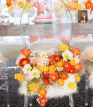 Bride's Floral Chair at Bridal Shower
Photography: Melody Melikian Photography
Read More:
http://www.insideweddings.com/weddings/stylish-bridal-shower-with-pops-of-punchy-shades-lovely-florals/989/ Bride seat at bridal shower ghost chair with white faux fur and lots of white yellow orange poppies