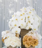 Neutral-Toned Arrangements
Photography: Samuel Lippke Studios
Read More:
http://www.insideweddings.com/weddings/elegant-summer-beach-wedding-in-southern-california/537/ Square boxes filled with white and gold flowers