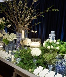Escort Card Table with Chinoiserie
Photography: KingenSmith
Read More:
http://www.insideweddings.com/weddings/luxe-jewish-wedding-with-personal-details-greenery-chinoiserie/1152/ escort card table mirror top with blue and white chinoiserie ginger jar vases floating candles white