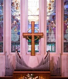 Cross and Organ at Church
Photography: Nathaniel Edmunds Photography
Read More:
http://www.insideweddings.com/weddings/church-ceremony-ballroom-soiree-inspired-by-the-streets-of-italy/1130/ Wedding venue church in indianapolis indiana large cross stained glass window organ pipes flowers