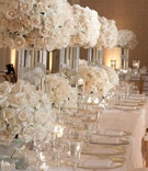 White Reception Décor
Photography: Joe Buissink Photography
Read More:
http://www.insideweddings.com/weddings/navy-pilots-dreamy-seaside-celebration-in-california/333/ Rose floral arrangements and gold-rimmed glassware