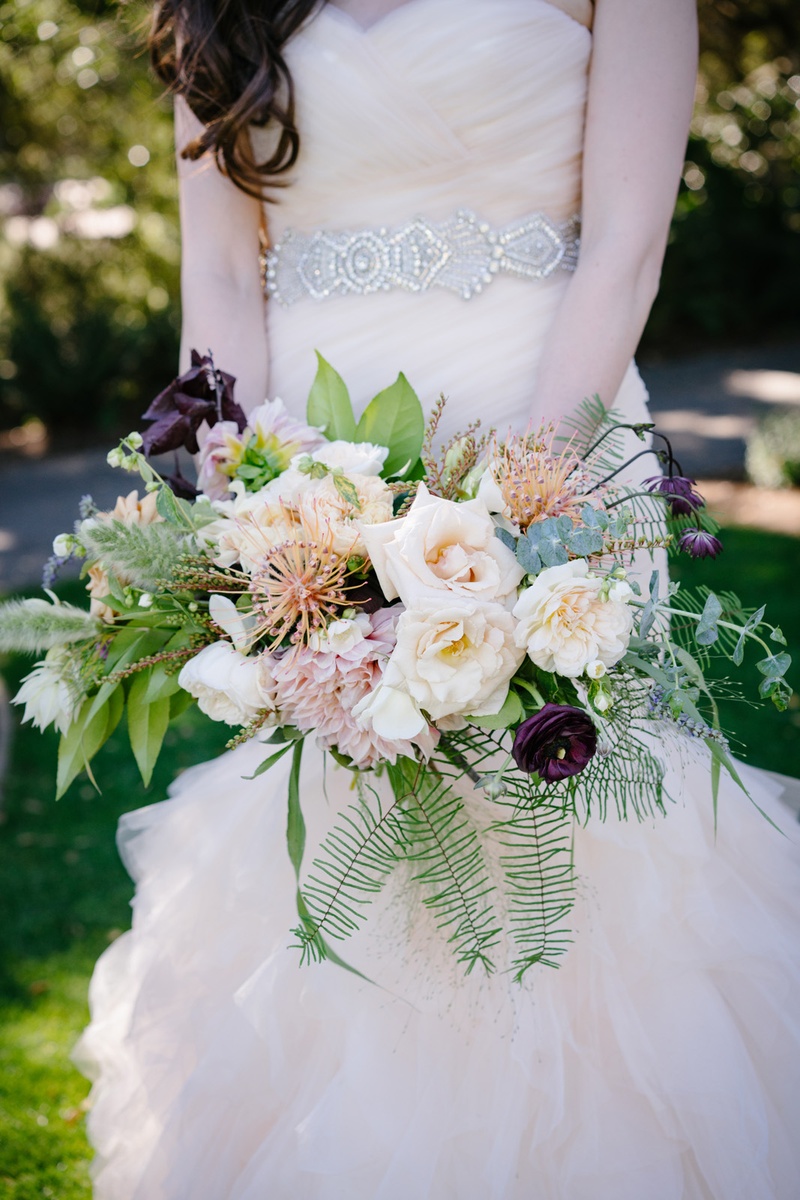 Eclectic Bridal Bouquet
Photography: Karlisch Photography
Read More:
http://www.insideweddings.com/weddings/modern-rustic-wedding-full-of-flowers-and-geometric-details/906/ loosely-structured bridal bouquet with fern, eucalyptus, dark plum, blush, ivory blossoms