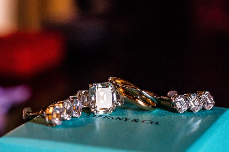 Emerald-Cut Diamond Engagement Ring
Photography: Roey Yohai Studios
Read More:
http://www.insideweddings.com/weddings/luxury-destination-wedding-in-palm-beach-with-almost-700-guests/1249/ wedding jewelry on top of tiffany and co box emerald cut diamond ring with side stones