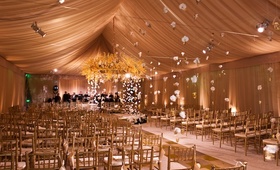 In-the-Round Ceremony
Photography: John Solano Photography %26 Nadine Froger Photography
Read More:
http://www.insideweddings.com/weddings/opulent-gold-wedding-in-beverly-hills-california/456/ Tented wedding ceremony with hanging flowers