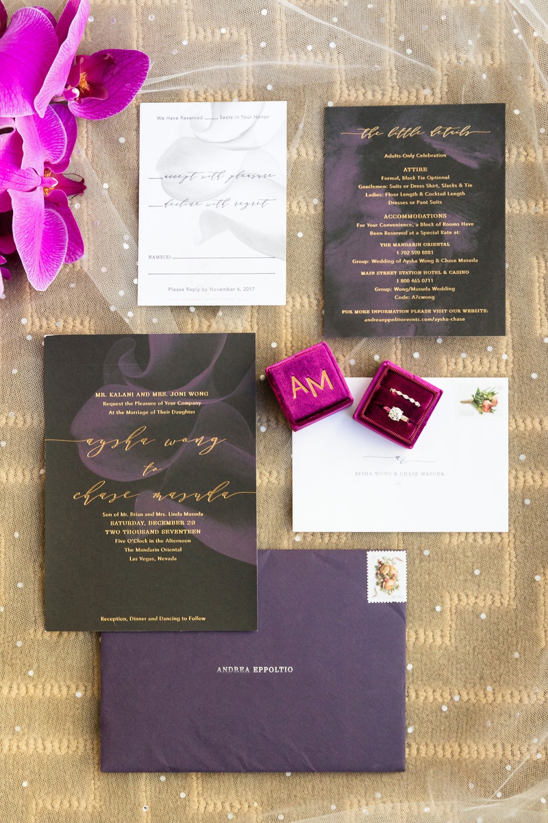 Charcoal and Purple Invitation Suite
Photography: Brian Leahy Photography
Read More:
http://www.insideweddings.com/weddings/a-hawaiian-couples-luxurious-destination-wedding-in-las-vegas/1226/ modern invitation suite with charcoal paper and abstract purple flowers, purple invitations