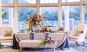 Lounge Seating at Dinner Table
Photography: Lucas Rossi
Read More:
http://www.insideweddings.com/weddings/vibrant-styled-shoot-with-colorful-bohemian-inspired-details/793/ lounge seating at wedding dining table tufted bench with bright boho blooms
