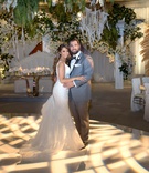 Bride %26 Groom on Illuminated Dance Floor
Photography: Curtis Dahl Photography
Read More:
http://www.insideweddings.com/weddings/spring-outdoor-ceremony-ballroom-reception-with-cultural-elements/1313/ bride in form fitting wedding dress groom in grey tuxedo dance floor with woven light projection