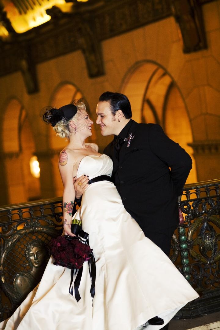 Brandon Saller, Drummer of Atreyu, and His Bride
Photography: Barnet Photography
Read More:
http://www.insideweddings.com/weddings/ashley-reeves-and-brandon-saller/261/ Brandon Saller, drummer of Atreyu, with bride in a stapless Alvina Valenta dress with a black sash