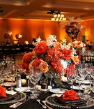 Bright Orange Reception Décor
Photography: TripleCord Photography
Read More:
http://www.insideweddings.com/weddings/beachside-summer-wedding-at-the-montage-laguna-beach/287/ Beaded charger plates with rose on napkin