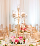 Tall Gold Candelabra Centerpiece
Photography: AL Weddings
Read More:
http://www.insideweddings.com/weddings/sophisticated-southern-wedding-with-pink-gold-color-palette/1212/ wedding reception round white table gold chairs pink flowers greenery gold candelabra salad course