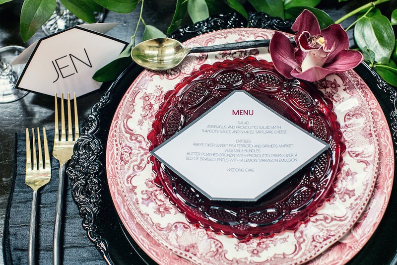 Striking Red, White %26 Black Place Setting
Photography: Kristina Lee Photography
Read More:
http://www.insideweddings.com/weddings/inspirational-wedding-shoot-with-black-red-white-geometric-decor/700/ Wedding place setting with black charger, white & red floral print china, red glass plate, cymbidium