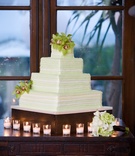Light Green Wedding Cake
Photography: David Michael Photography
Read More:
http://www.insideweddings.com/weddings/cool-classic-california-wedding-with-unique-guestbook/249/ Four layer cake with white and lime green frosting