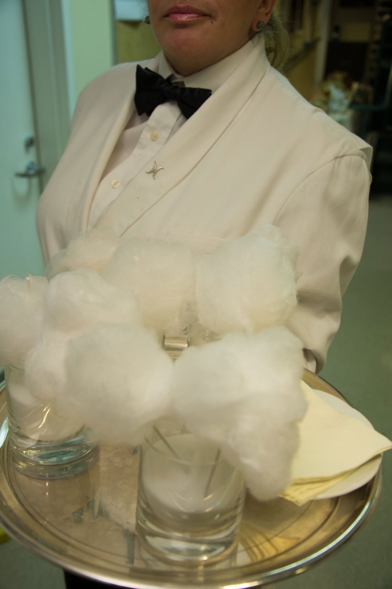 Poufs of Cotton Candy on Tray
Photography: John Solano Photography
Read More:
http://www.insideweddings.com/weddings/an-opulent-garden-ceremony-ballroom-reception-in-beverly-hills/986/ Wedding server white tuxedo jacket with silver tray of cotton candy clouds in glasses for late night