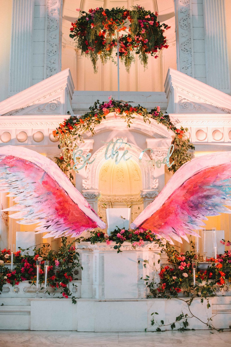 "Be The Good" Sign, Wings on Altar
Photography: Krista Mason Photography
Read More:
http://www.insideweddings.com/weddings/mediterranean-inspired-styled-shoot-featuring-unique-details/856/ be the good sign altar wings bold pink purple blue red wedding ceremony altar