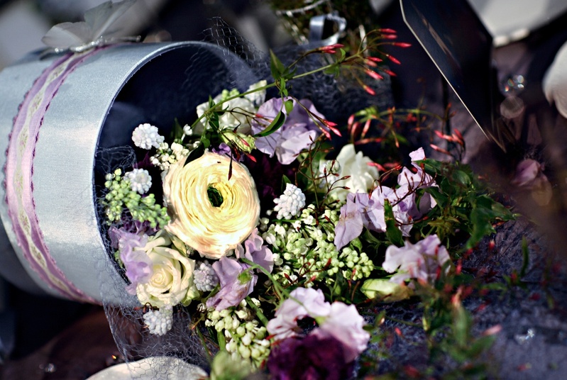 Floral Decor
Photography: Marie Labbancz Photography
Read More:
http://www.insideweddings.com/weddings/elegant-spring-wedding-at-the-pennsylvania-academy-of-the-fine-arts/176/ Wedding reception floral arrangement of yellow, white, light purple, and red flowers