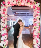 Couple in Floral Doorframe
Photography: Perez Photography
Read More:
http://www.insideweddings.com/weddings/church-ceremony-classic-country-club-reception-with-pink-palette/1284/ bride in romona keveza, groom in suit, newlyweds pose in pink floral frame of hydrangeas