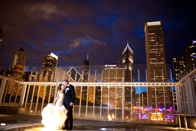 Newlyweds and the Chicago Skyline
Photography: Eric Kelley
Read More:
http://www.insideweddings.com/weddings/summer-wedding-with-clean-color-palette-modern-design-in-chicago/776/ bride in vera wang gown groom in j. crew, Chicago skyline at night