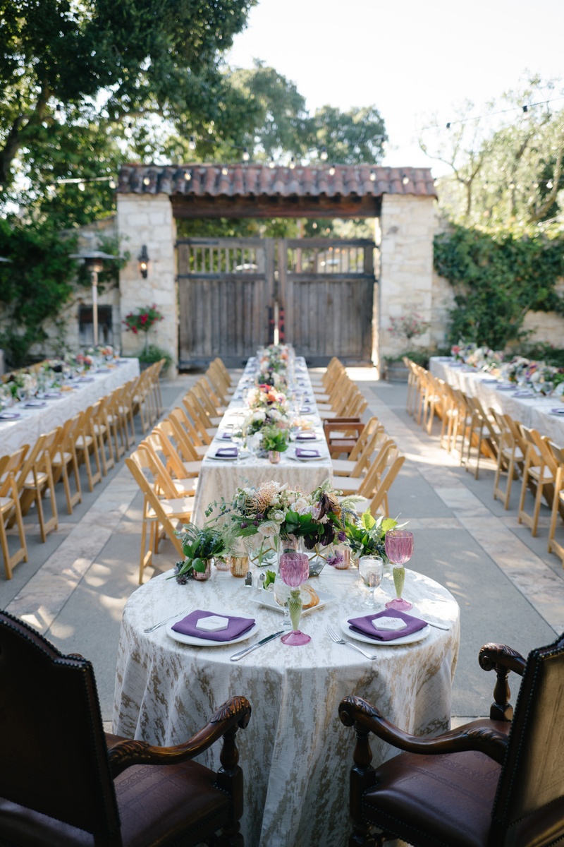 Sweetheart Table with Formal Chairs, Outdoor Wedding
Photography: Karlisch Photography
Read More:
http://www.insideweddings.com/weddings/modern-rustic-wedding-full-of-flowers-and-geometric-details/906/ Elegant dark plum chairs at sweetheart table purple napkins low centerpieces outdoor wedding