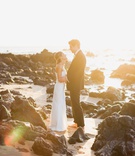 Golden Hour on the Shore
Photography: Marissa Maharaj
Read More:
http://www.insideweddings.com/weddings/destination-wedding-in-maui-with-both-classic-and-tropical-touches/1248/ bride in j. mendel wedding dress, groom in ralph lauren purple label suit, golden hour portrait maui