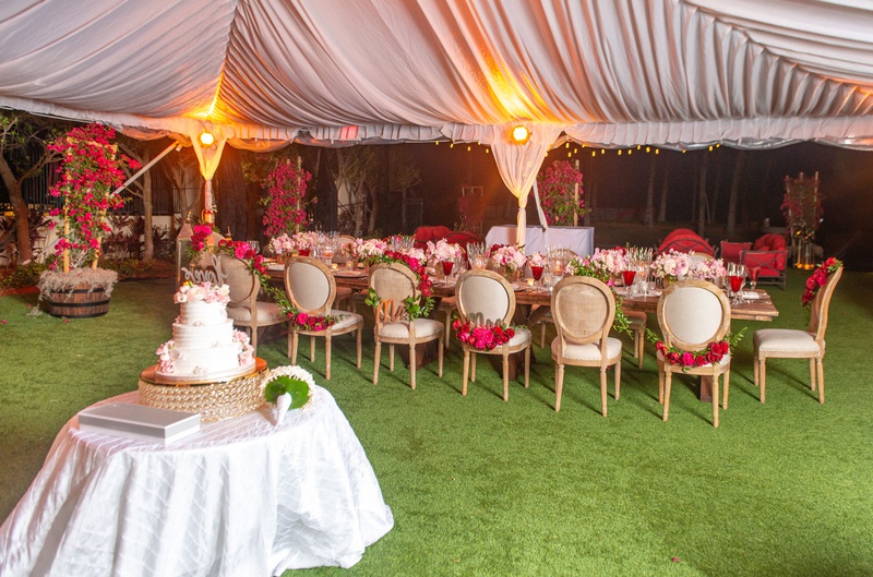 Tented Wedding for Intimate Group
Photography: Suzanne Delawar Studios
Read More:
http://www.insideweddings.com/weddings/intimate-oceanfront-wedding-with-romantic-red-pink-white-palette/1235/ wedding reception acqualina resort and spa tent reception long head table pink red flowers