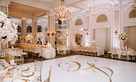 Elegant Ballroom Ceremony with Gold Monogram
Photography: Janelle Elise Photography
Read More:
http://www.insideweddings.com/weddings/luxurious-real-wedding-with-gold-ivory-blush-palette-in-atlanta/1209/ wedding reception ballroom white gold dance floor chandelier tall centerpiece white pink flowers