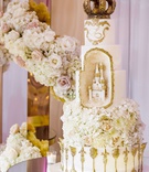 White %26 Gold Royal Wedding Cake
Photography: Amy Anaiz Photography
Read More:
http://www.insideweddings.com/weddings/luxurious-royal-inspired-ballroom-real-wedding-at-a-castle-venue/1365/ white gold wedding cake castle gold ornate details geode element with castle sculpture crown topper