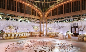 Circular Gold Design on Dance Floor
Photography: Christian Oth Studio
Read More:
http://www.insideweddings.com/weddings/traditional-cathedral-wedding-luxury-reception-in-new-york-city/1331/ wedding reception new york public library gold design on large dance floor roses hanging from arches