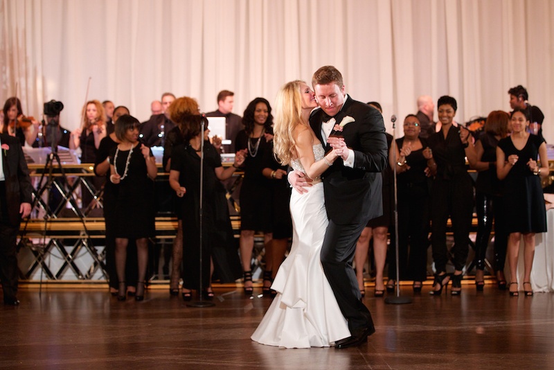 Bride %26 Groom's First Dance
Photography: Bob %26 Dawn Davis Photography
Read More:
http://www.insideweddings.com/weddings/glamorous-ivory-blush-spring-wedding-at-a-private-club-in-chicago/685/ Bride in a strapless Pnina Tornai dress dances with groom in black tuxedo