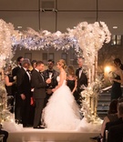 Jewish Ceremony with Wintry Décor
Photography: The Day by Ira Lippke
Read More:
http://www.insideweddings.com/weddings/elegant-winter-wedding-with-frosted-decor-at-a-museum-in-brooklyn/1113/ Bride and groom with family under chuppah winter decorations brooklyn