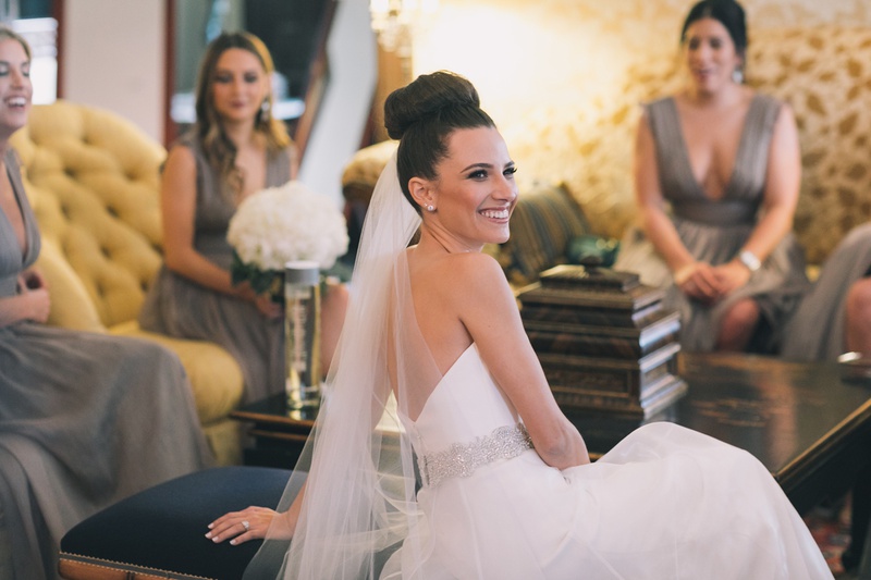Bride Lounging with Bridesmaids
Photography: Black %26 Hue Photography
Read More:
http://www.insideweddings.com/weddings/church-ceremony-chic-museum-reception-in-palm-beach-florida/1260/ bride in romona keveza, beaded belt, sock bun, lounging with bridesmaids