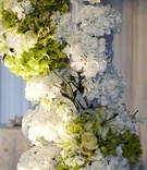 Chuppah Wedding Flowers
Photography: KingenSmith
Read More:
http://www.insideweddings.com/weddings/elegant-wedding-with-modern-details-at-a-private-estate/383/ Green and white hydrangea, lily, and rose flowers
