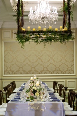 Silver Tablecloths With Lace Runners And Short Florals Silver Tablecloths With Lace Runners And Short Florals