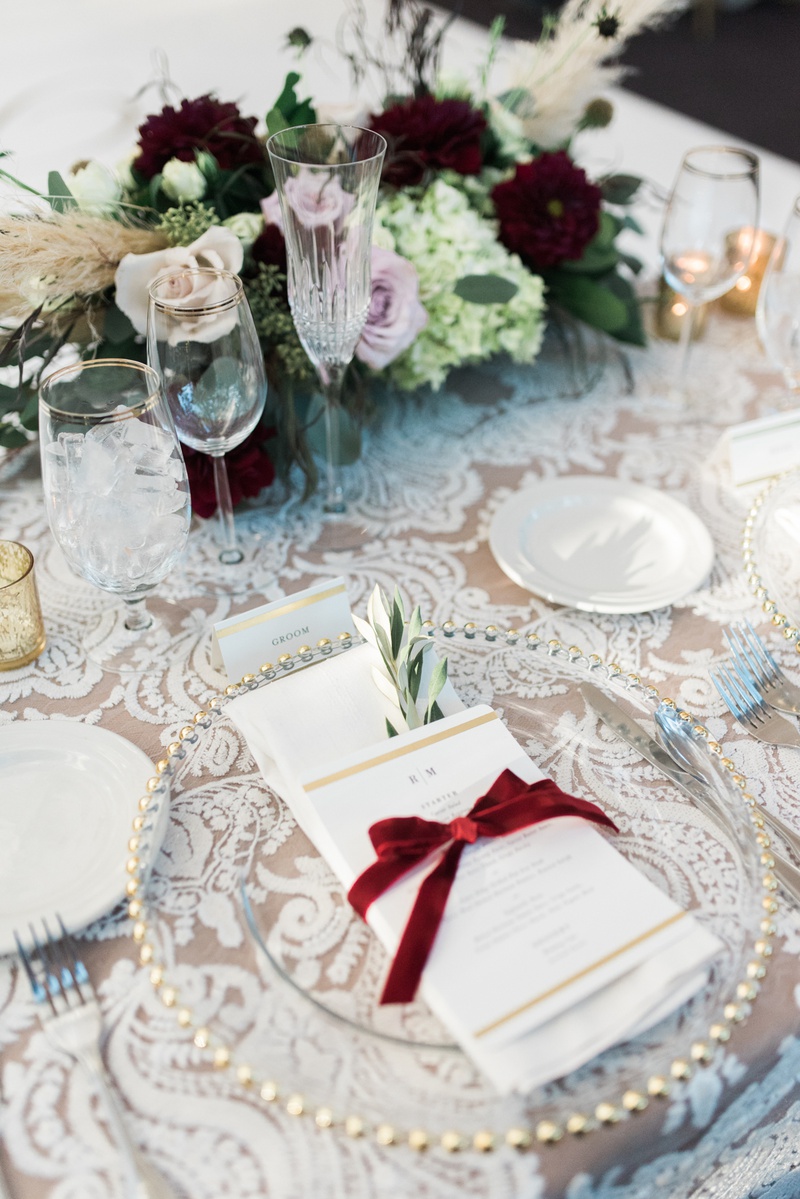 Menu Tied with Velvet Ribbon
Photography: Hello Blue Photo
Read More:
http://www.insideweddings.com/weddings/boho-chic-wedding-with-traditional-jewish-ceremony-in-malibu/1156/ lace linens at reception, menu tied with red velvet ribbon