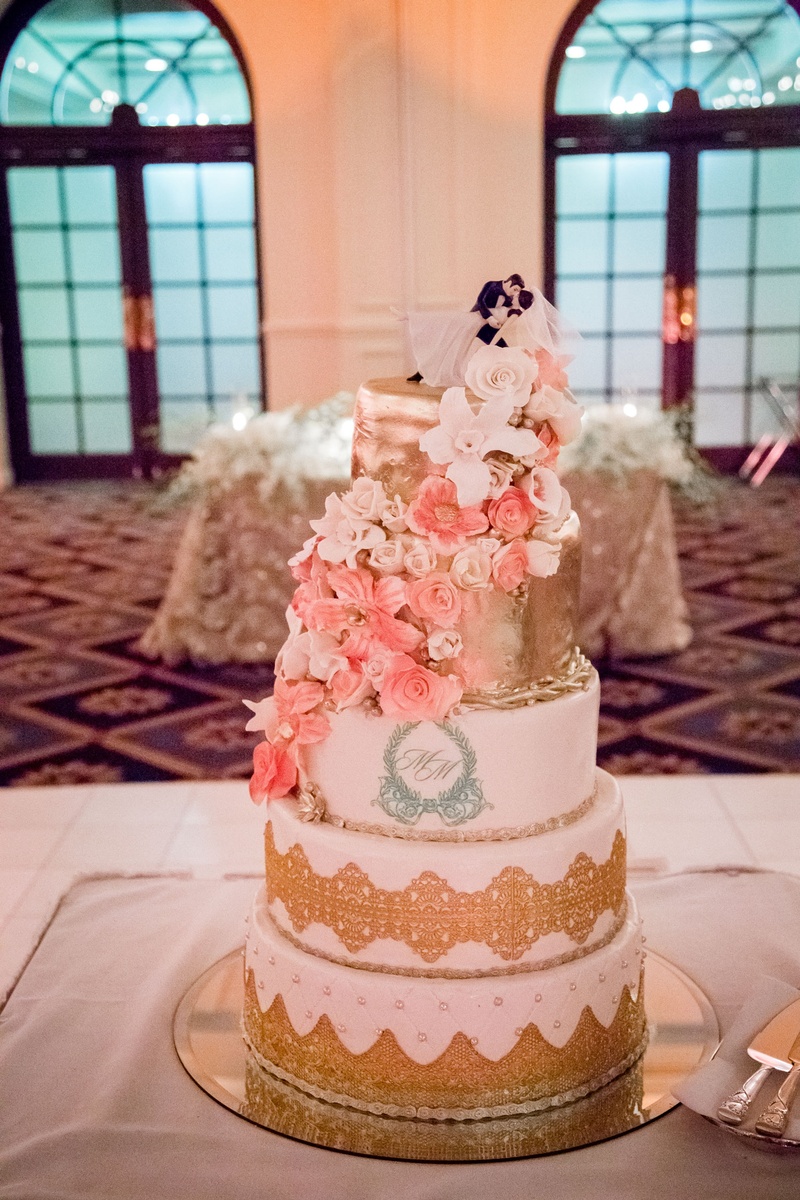 Wedding Cake with Sugar Flowers %26 Monogram
Photography: Magnolia Studio
Read More:
http://www.insideweddings.com/weddings/charming-church-ceremony-romantic-ballroom-reception-in-quebec/1075/ Wedding cake with gold details and sugar flowers in white and pink classic cake topper monogram