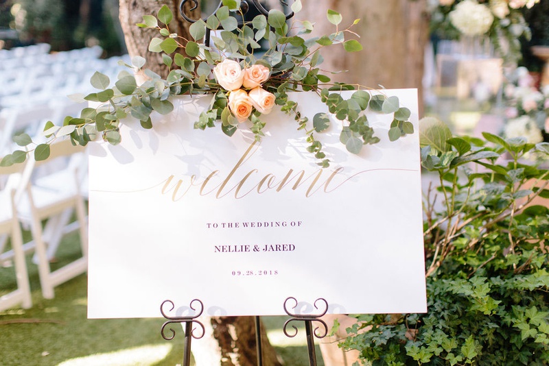Welcome Sign with Eucalyptus %26 Roses
Photography: Ashley Paige Photography
Read More:
http://www.insideweddings.com/weddings/elegant-outdoor-fall-wedding-at-a-rustic-chic-venue-in-malibu/1244/ wedding ceremony welcome sign gold calligraphy eucalyptus peach rose flowers