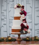 Wedding Cake with Wood Motif
Photography: Cadence %26 Eli Photography
Read More:
http://www.insideweddings.com/weddings/romantic-woodsy-autumn-at-home-tented-wedding-in-minnesota/1271/ wedding cake with wood trim design and fresh flowers fall colors on wood vintage table birch branch