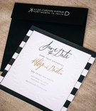 Checkered Save-the-Date Card
Photography: Vue Photography
Read More:
http://www.insideweddings.com/weddings/southern-lake-house-wedding-with-ivory-and-green-color-palette/534/ Letterpress leaf motif on card with black envelope