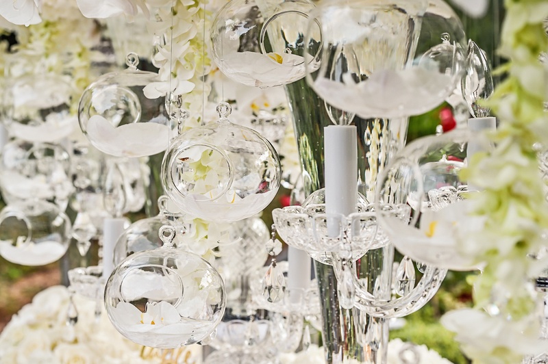 Orchids in Open Glass Orbs
Photography: Carasco Photography
Read More:
http://www.insideweddings.com/weddings/styled-shoot-combines-old-world-charm-and-contemporary-fashion/849/ wedding centerpieces with an orchid blossom encased in glass orbs
