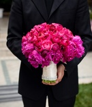 Fuchsia Bridal Bouquet
Photography: Jasmine Star Photography
Read More:
http://www.insideweddings.com/weddings/romantic-garden-wedding-in-beverly-hills-california/450/ Groom holding peony flowers wrapped in ribbon